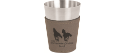 A fun, customizable shot glass.  It is stainless steel with a leather wrap.  It comes in a variety of colors.  Great for wedding party gifts, Valentine's, New Years or any special occasion.
